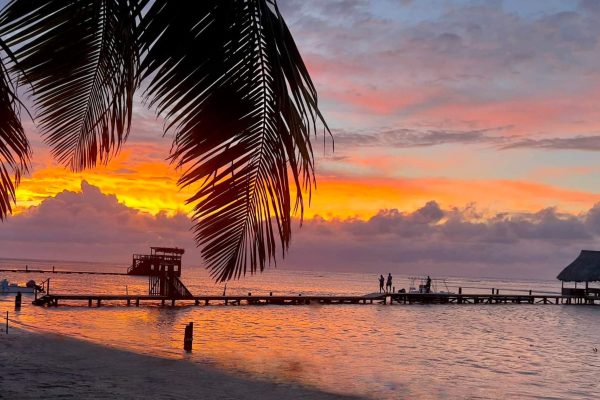 Sunset from the shoreline in Sandy Bay, Roatan