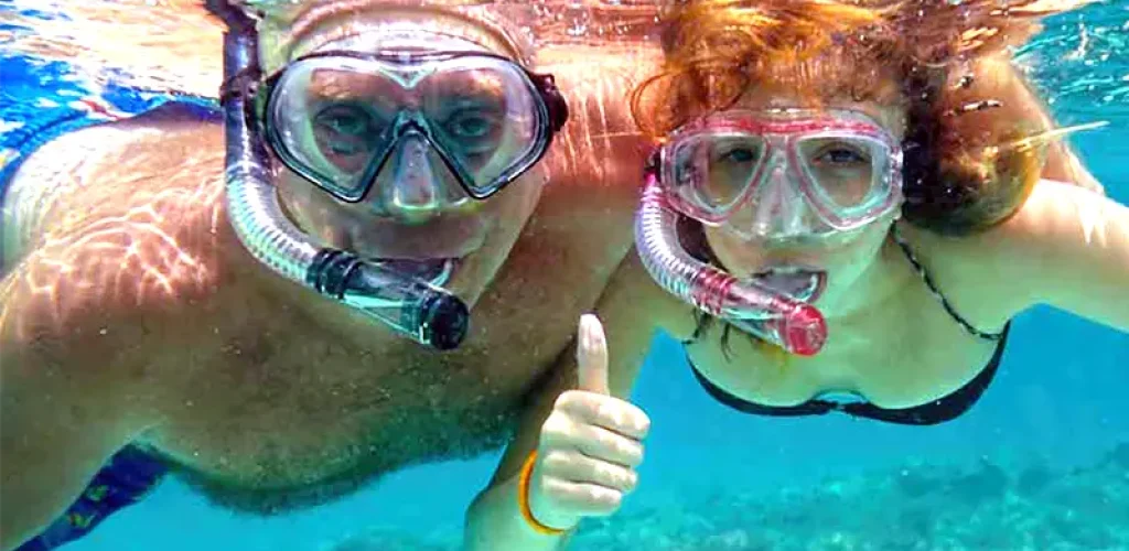 Guests Snorkeling Right Off Our Beach at Hummingbird Casitas