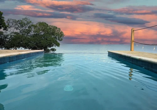 A Fresh-Water Pool With An Infinity-Edge And Sundeck Right On The Beach